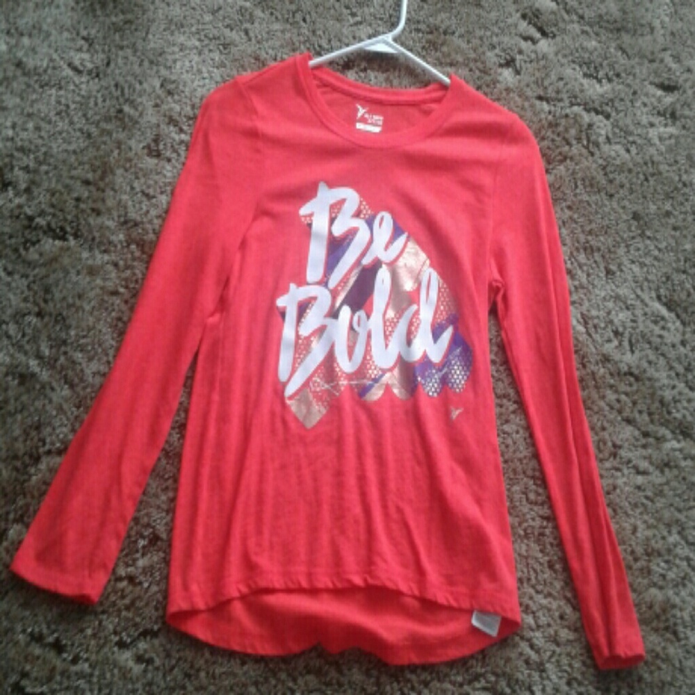 Orangish redish long sleve shirt